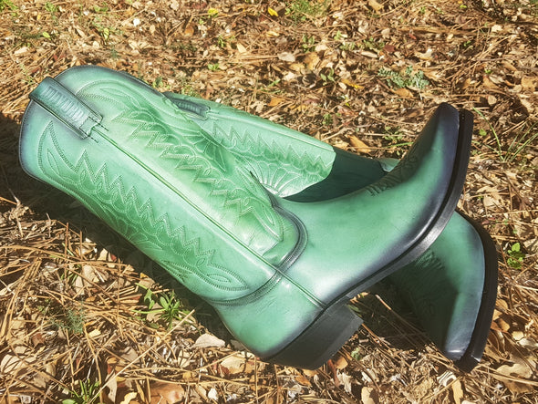 Cowboy boots for women and men in ecological and handcrafted green leather
