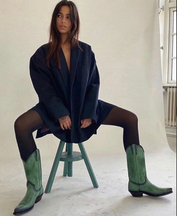 Modern and urban women's green leather cowboy boots