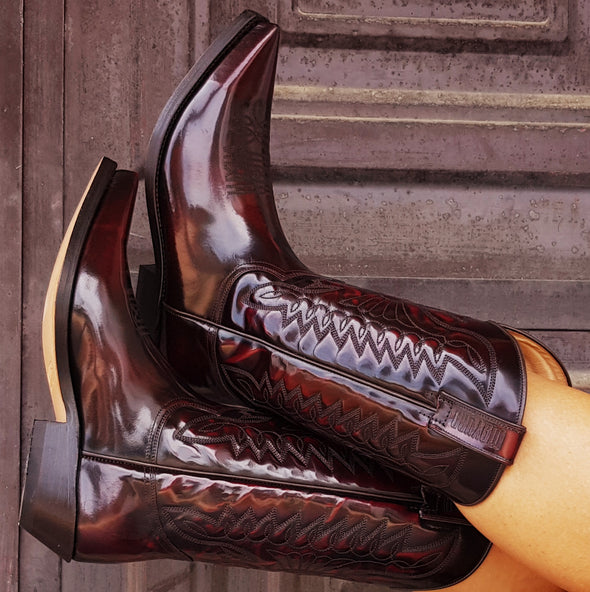 Women's and Men's Cowboy Boots in shiny dark red patent leather