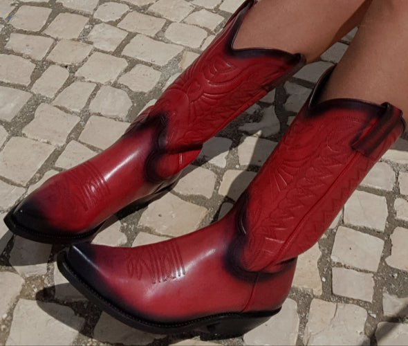 Women's boots in red cowboy style all in leather with pointed toe and heel
