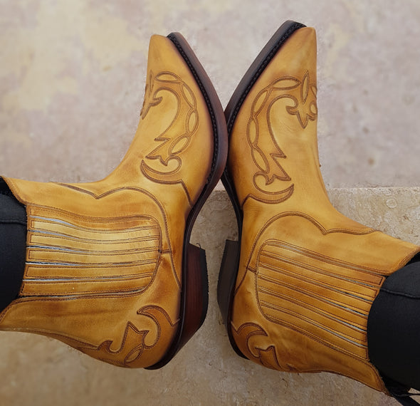 Urban and stylish men's yellow ankle boots in handcrafted leather