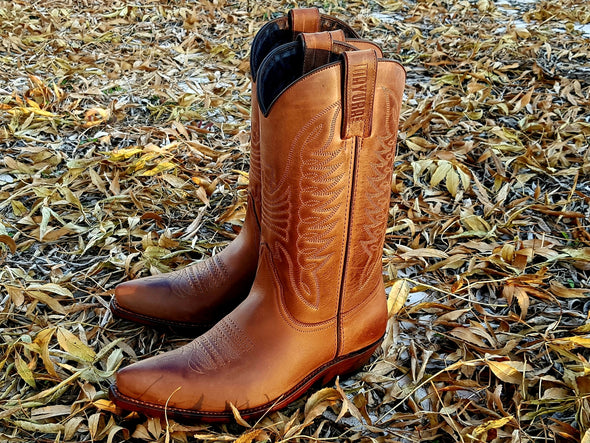 Rustic Women's Cowboy Boots in brown with an artisanally worked and sewn upper